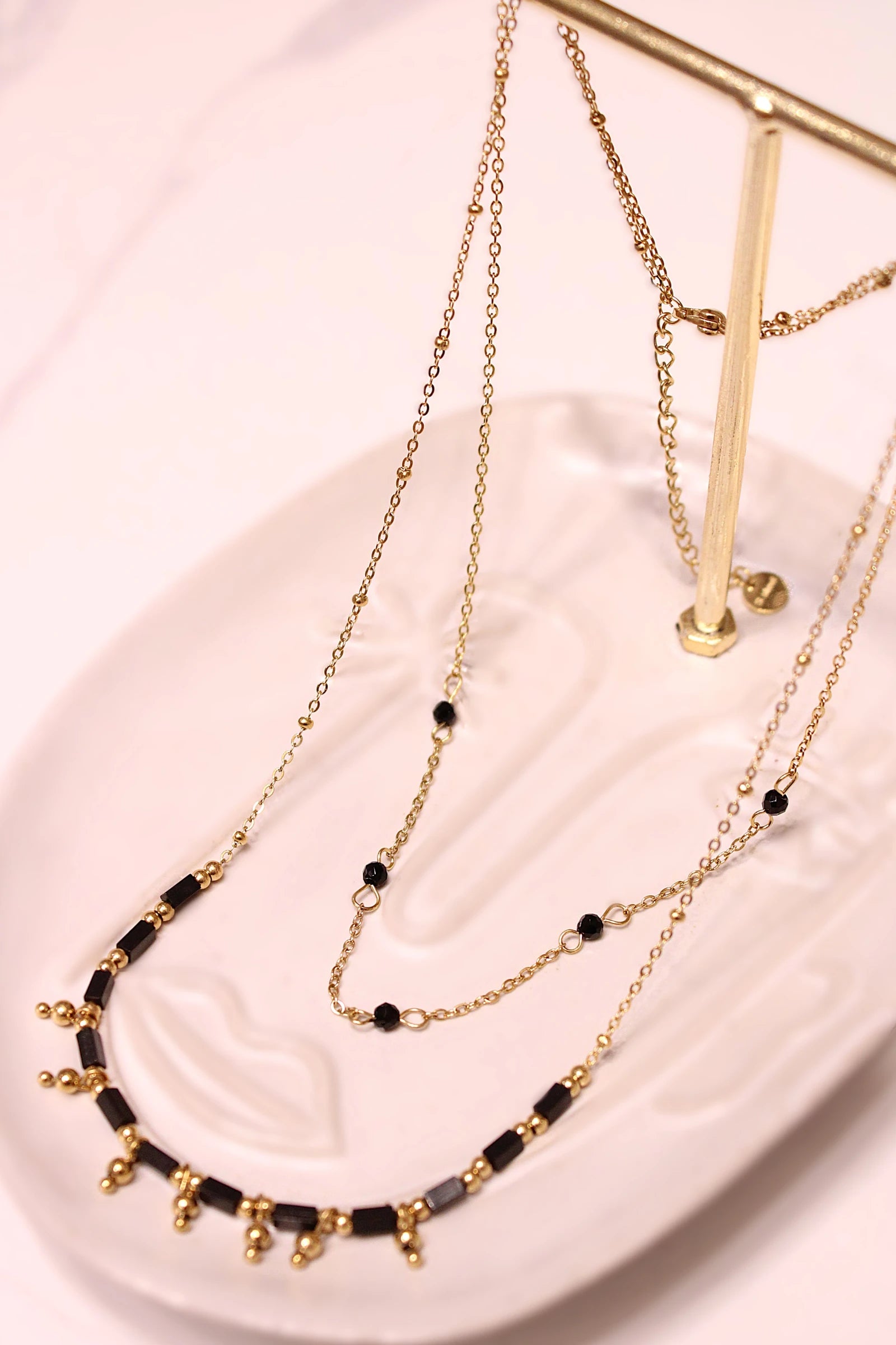 Double row necklace with natural stone beads and minimalist pendant