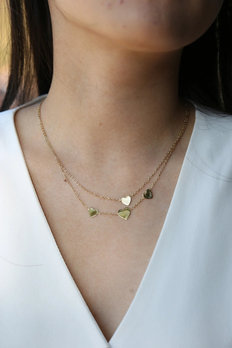 Double row necklace with heart pendants