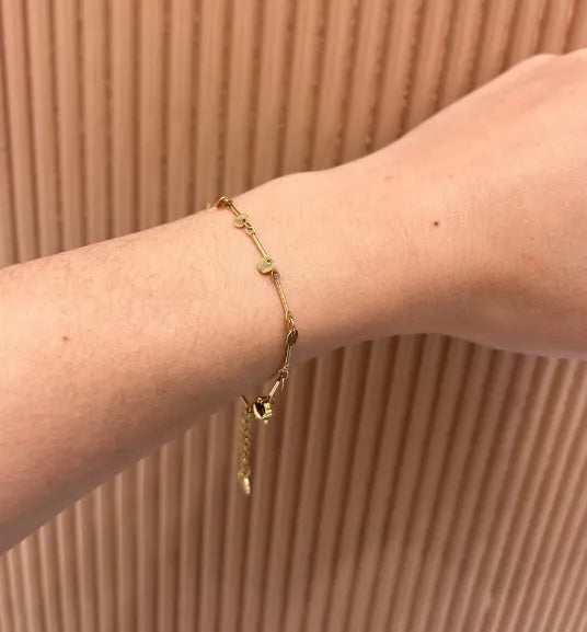 Thin bracelet with  geometric pendants